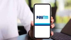 “Paytm app interface showing digital wallet, UPI payments, and mobile recharge services.”